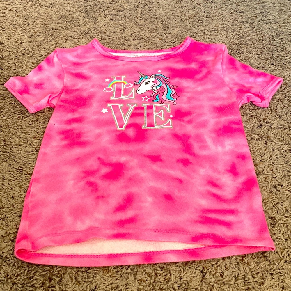 A tie die pajamas. Pink and a little bit of white.